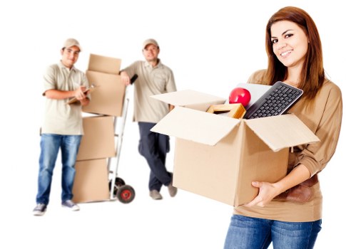Organised Stepney household storage space with furniture and packed items
