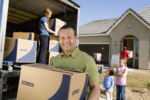 Professional movers packing household items for Stepney relocation